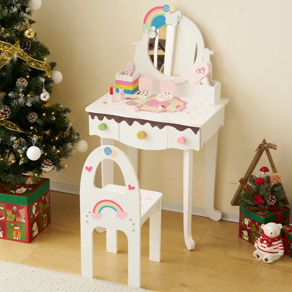 White princess vanity table for toddlers with a matching stool, three storage drawers, and colorful pretend play makeup toys on top