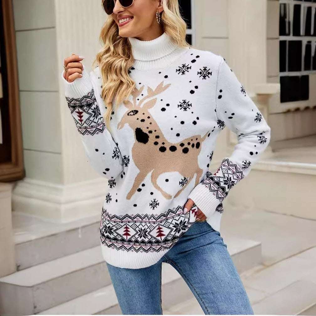 Woman wearing a white sweater with reindeer design outdoors.