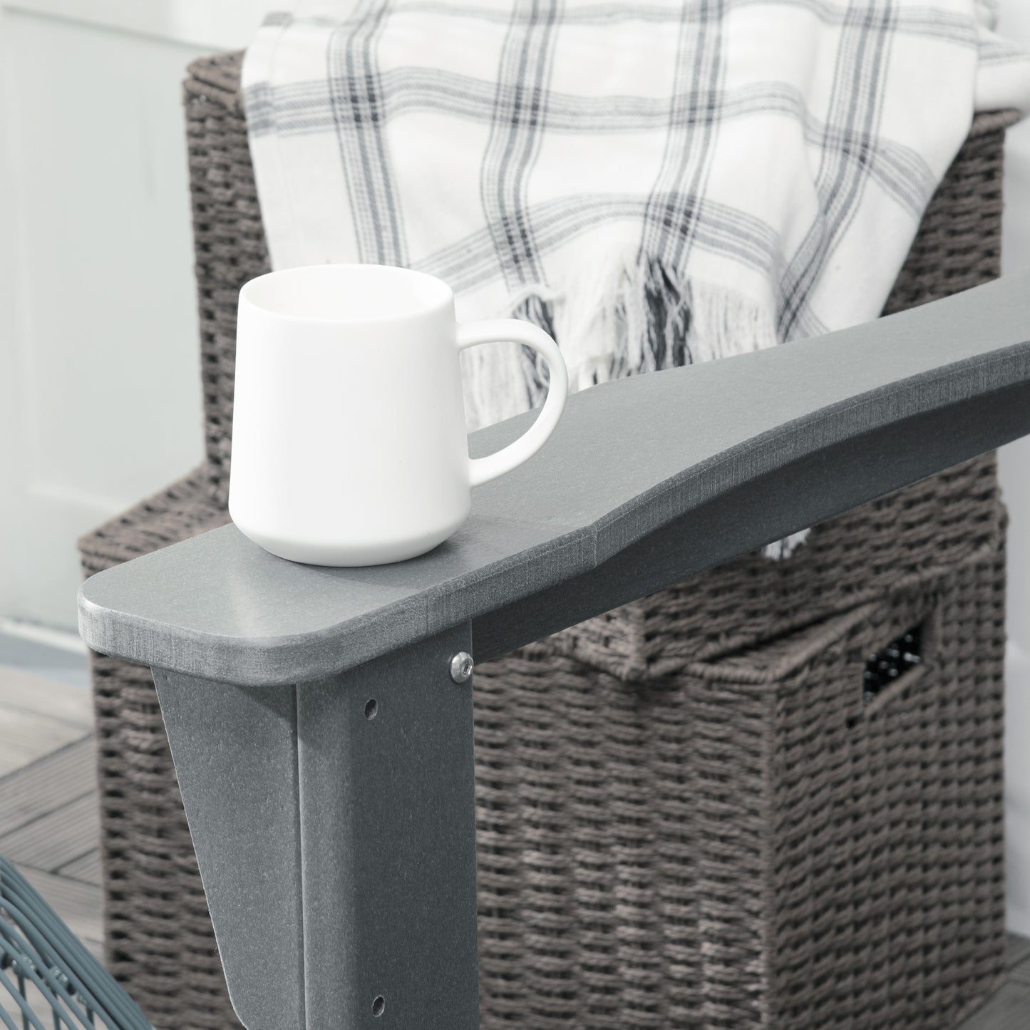 Light gray Adirondack rocking chair armrest and flat seat surface