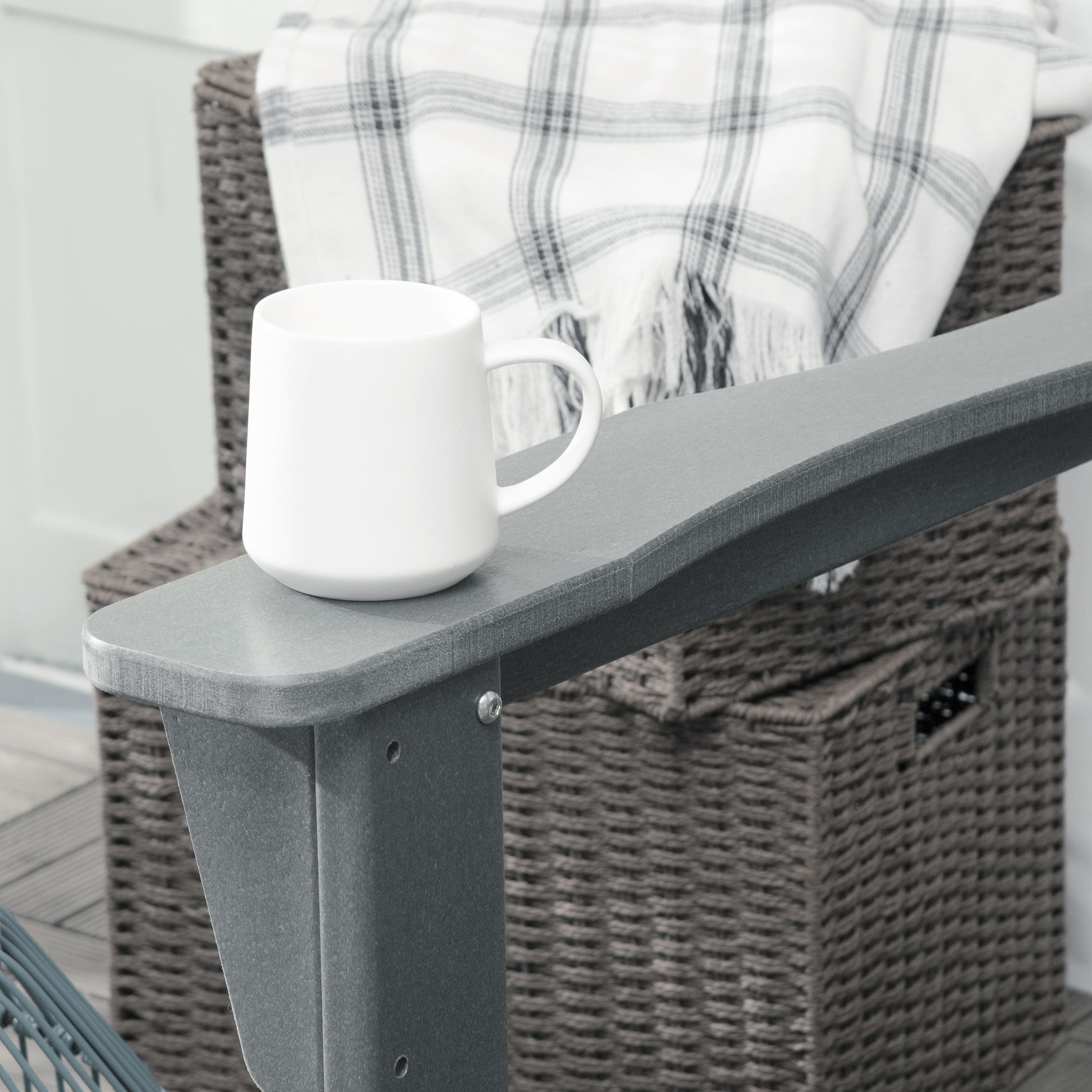 Light gray Adirondack rocking chair armrest and flat seat surface