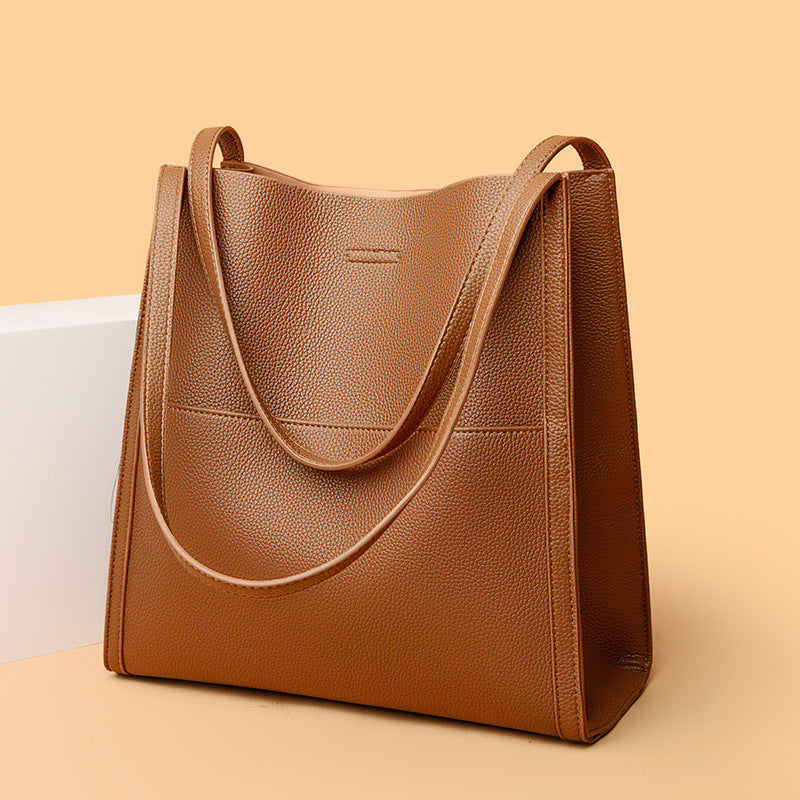 Large commuter tote bag, tan leather look, double top handles, front pocket