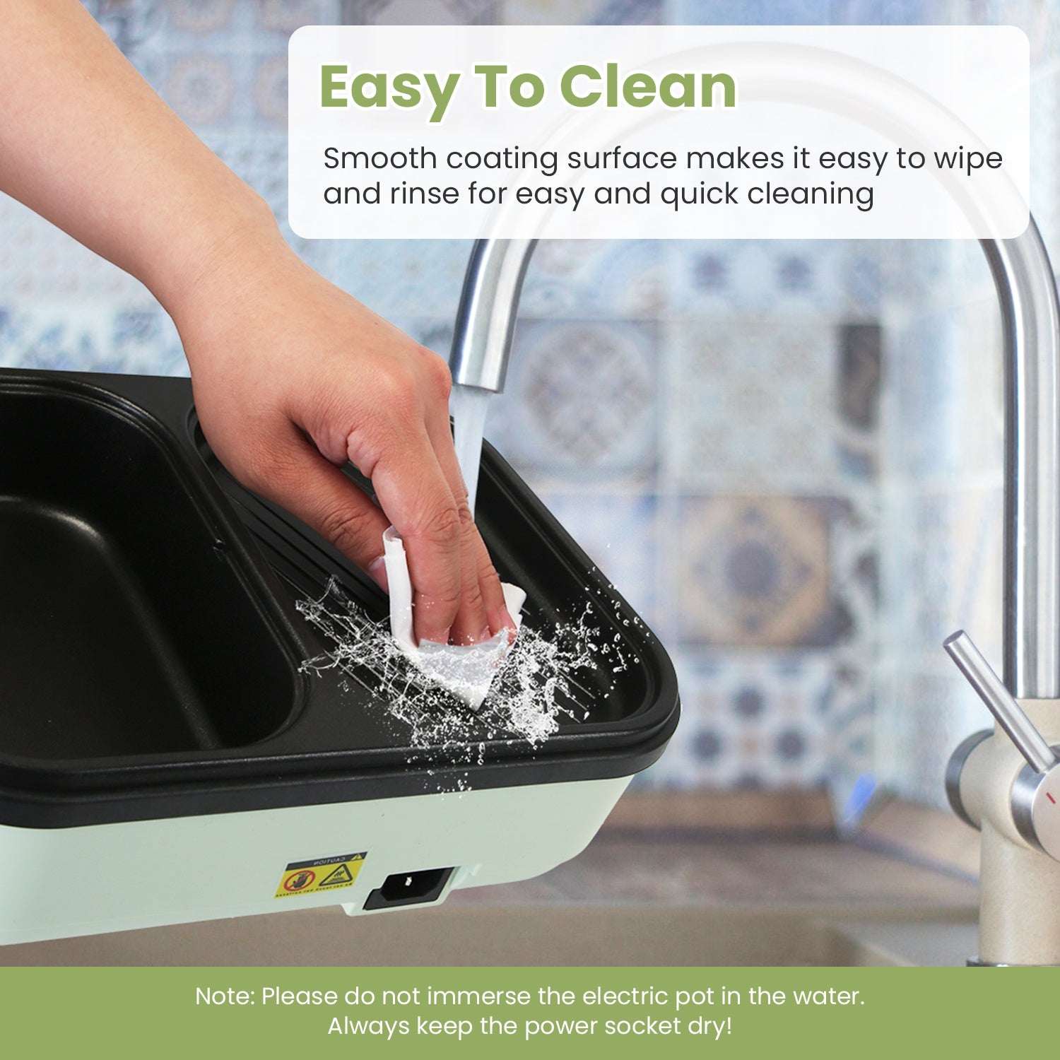 2-in-1 electric hot pot and grill with glass lid being wiped for easy cleaning