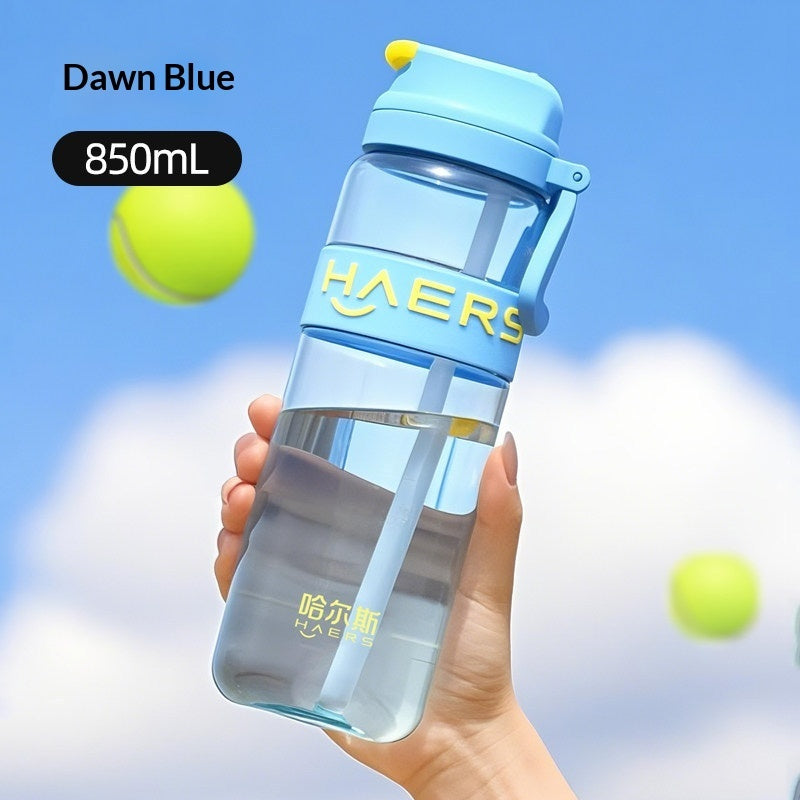 Light blue leak-proof water bottle with straw lid, 850ml and carry loop