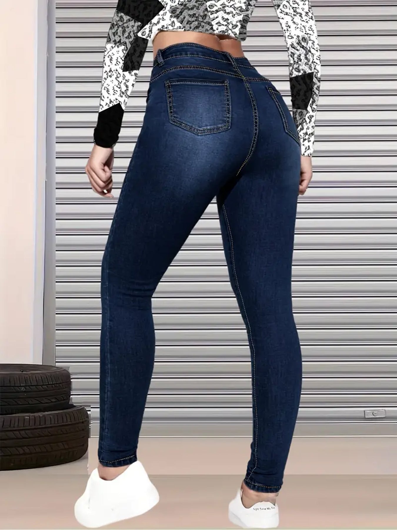 High-Waisted Hip-Lifted Ripped Nine-Quarter Jeans