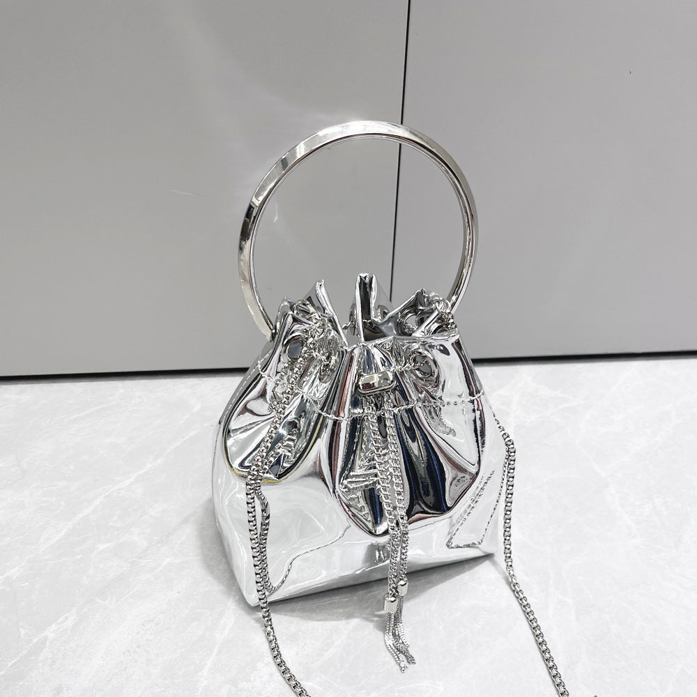 Metallic chain messenger bag, glossy silver finish, round top handle, chain shoulder strap