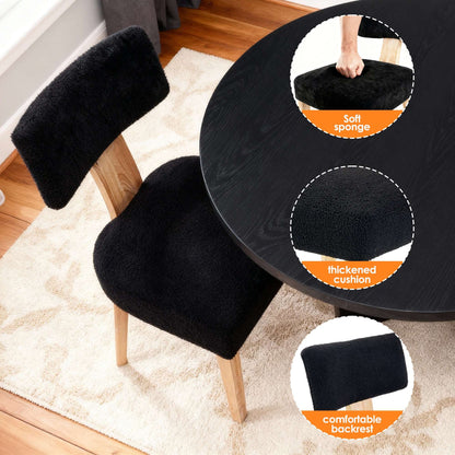 Black upholstered dining chair with thick seat and armrest, light wood legs