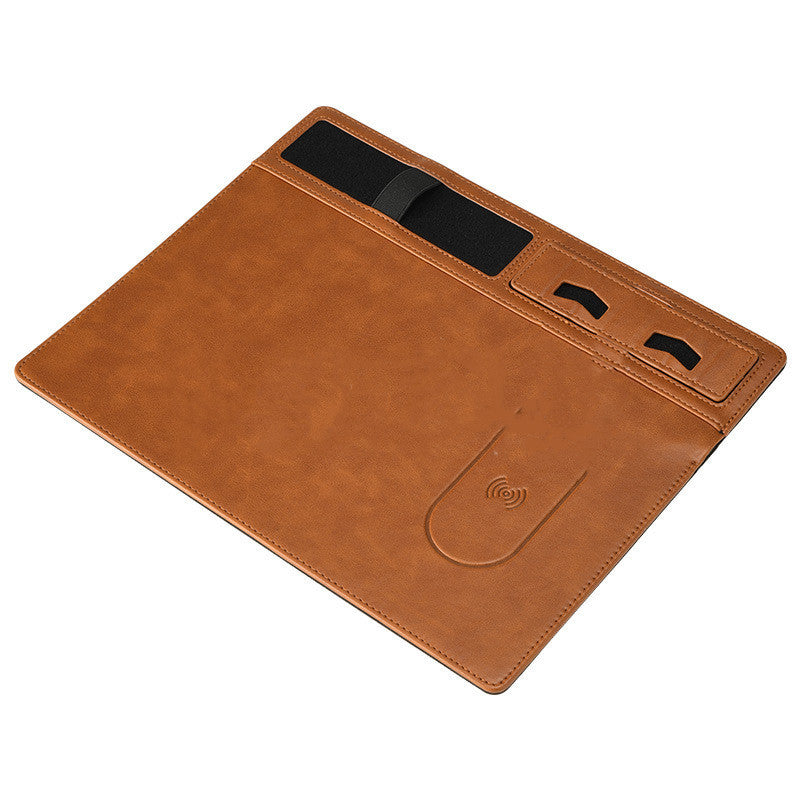 Brown leather mouse pad with cutouts on a white background