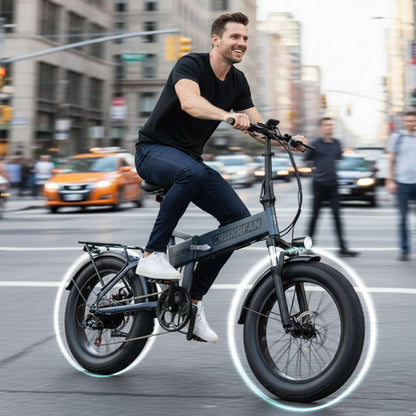 Electric commuter e-bike with fat tires, city street side view with rider