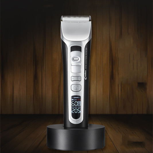 Hair trimmer on a wooden background