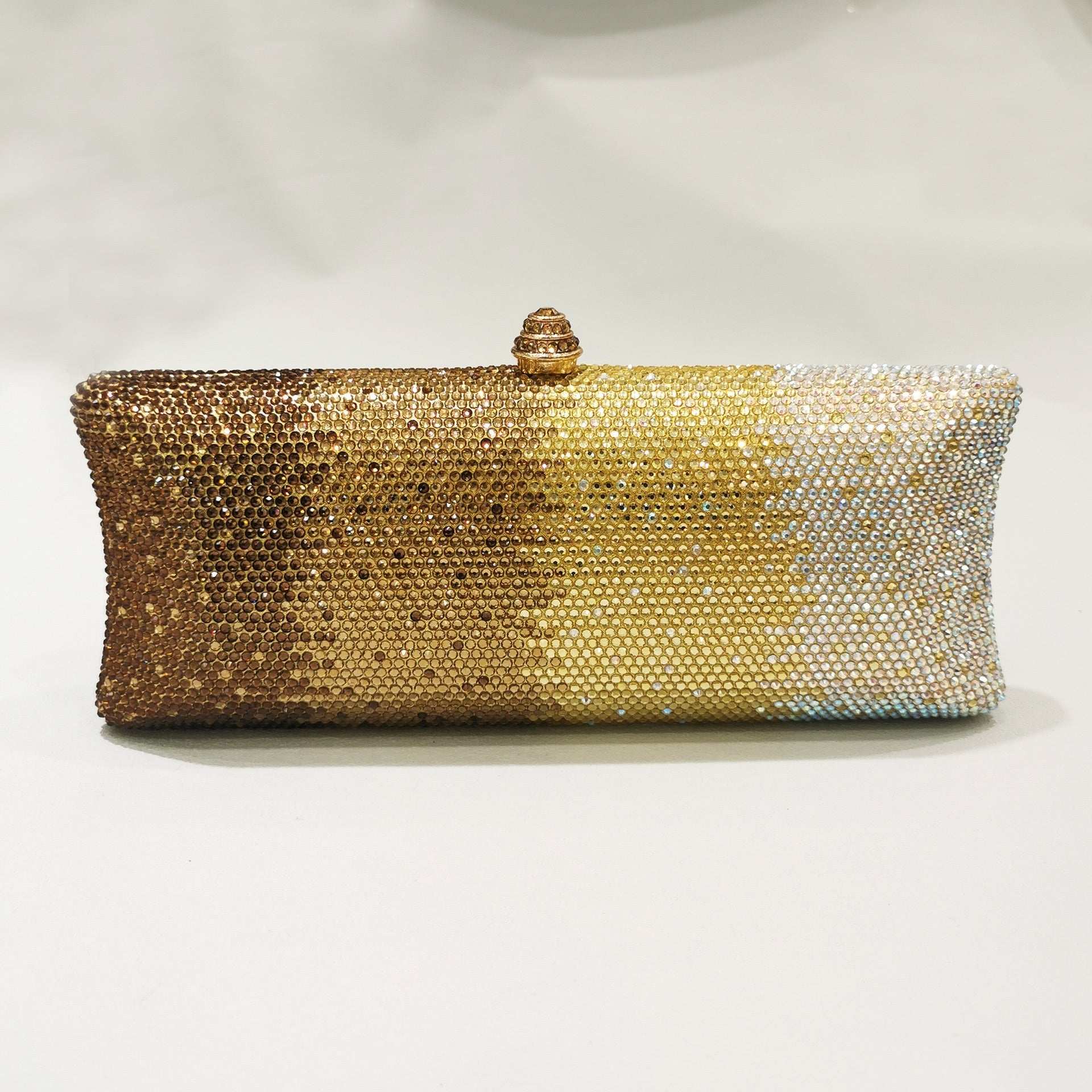 Rhinestone gradient dinner clutch with top clasp and chain, gold to white