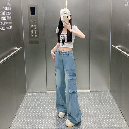 Light blue cargo pants with stacked leg pockets and wide straight legs, floor length