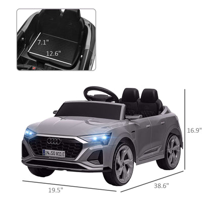 Gray kids ride-on car front view with dashboard, open-top seats, and LED headlights