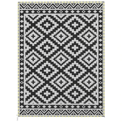 Square outdoor rug with black and white repeating geometric diamond pattern