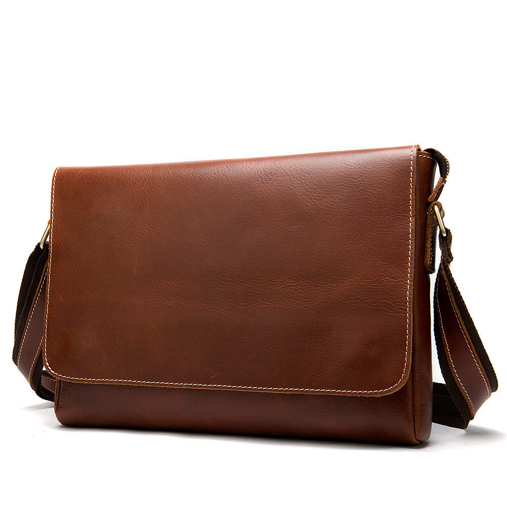 Men's retro shoulder bag, warm reddish-brown leather with flap and adjustable strap