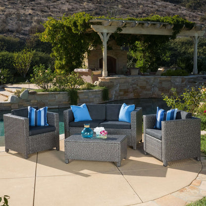 Gray patio set with loveseat and 2 armchairs, with square coffee table
