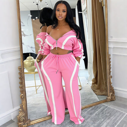 Contrast-striped two-piece cardigan set with off-shoulder cropped top and drawstring pants, pink/white