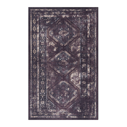 Washable area rug close view with distressed geometric medallion pattern in dark black and burgundy
