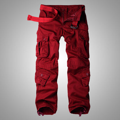 Men's cargo pants in red with multiple flap pockets and a secured belt-strap at waist