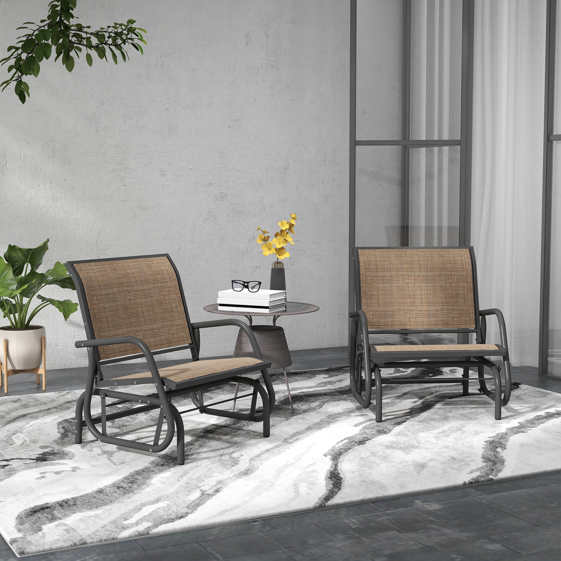 Outdoor steel glider chair set with black rocker base and tan woven seat cushions