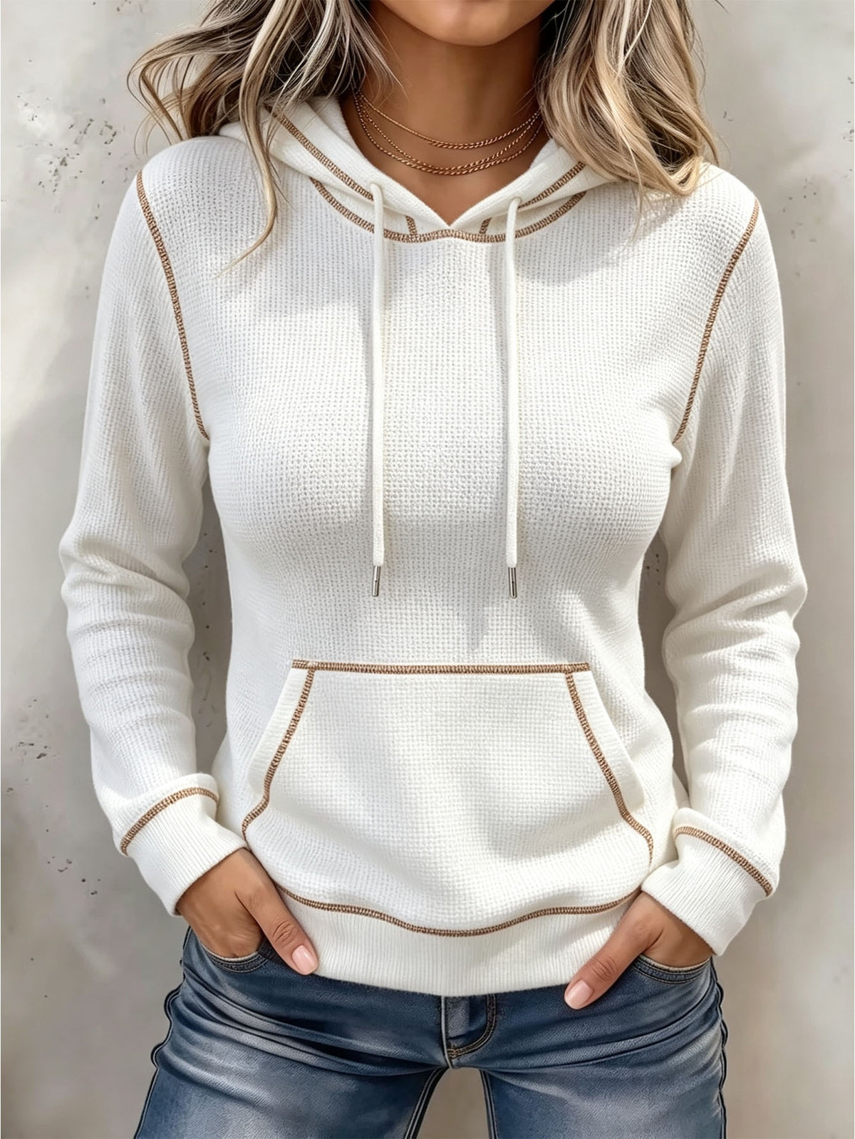White long-sleeve hoodie with drawstring hood and front kangaroo pocket
