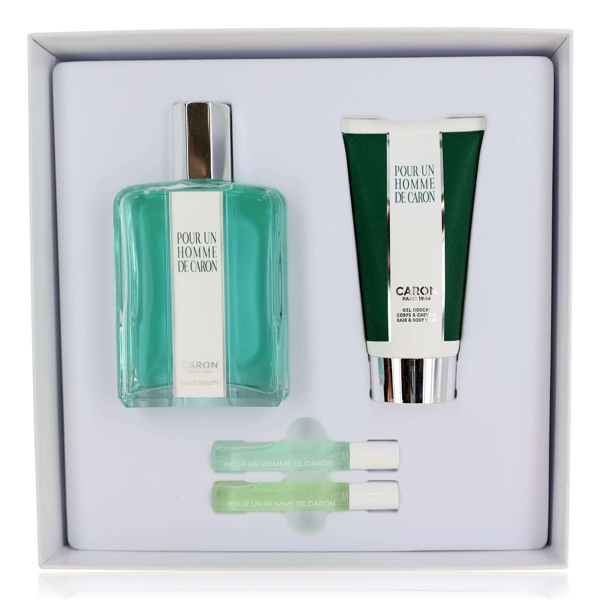 Men's 4-piece fragrance gift set with glass bottle, tube, and two sample vials
