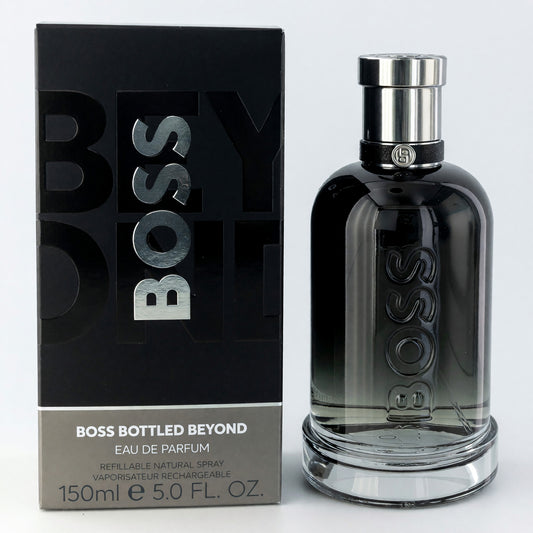 Men's eau de parfum spray bottle, clear glass with silver cap and black label