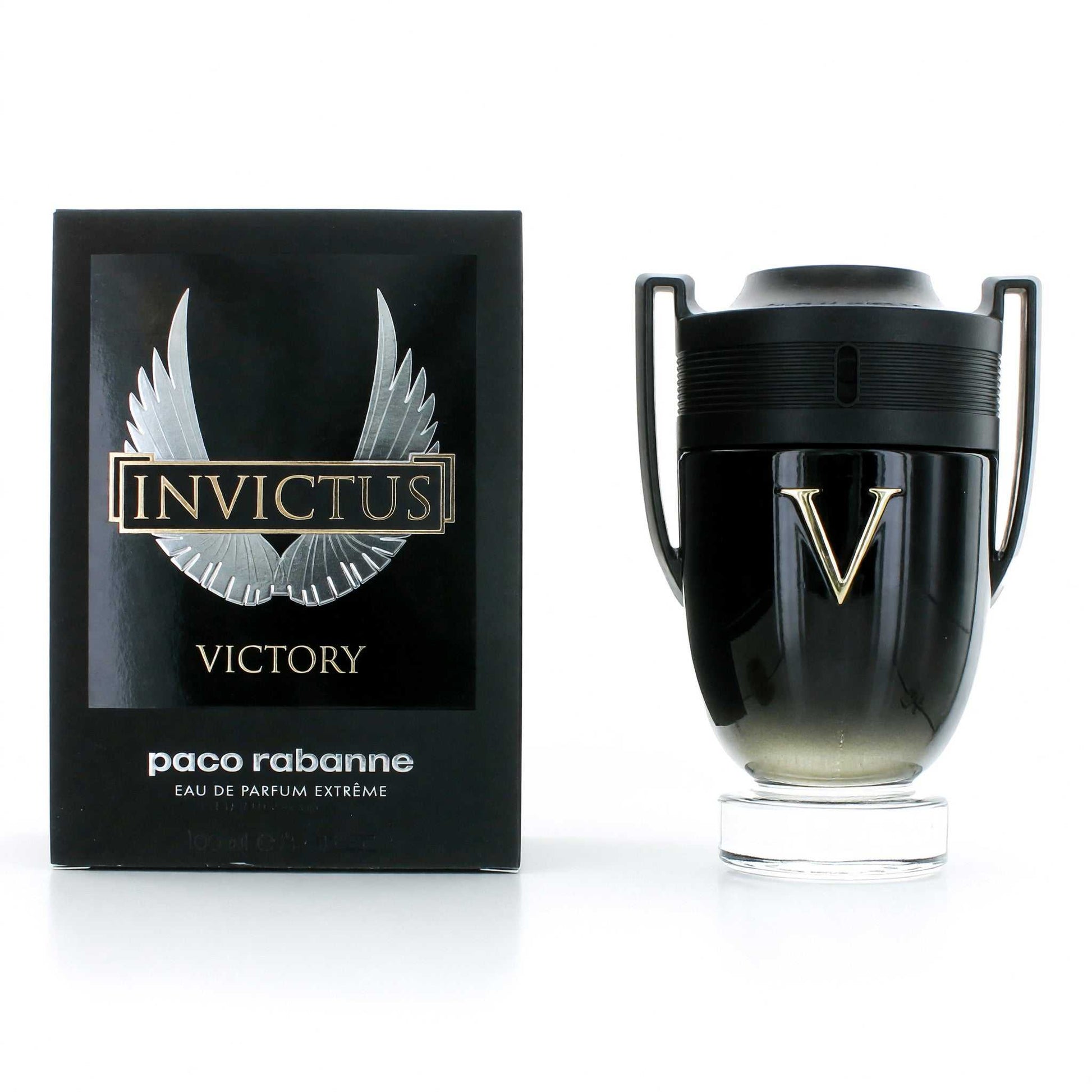 Men’s EDP spray bottle with black trophy-style cap and glass base, plus Invictus Victory box