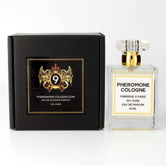 Men's pheromone cologne eau de parfum spray bottle with gold-capped clear glass and box