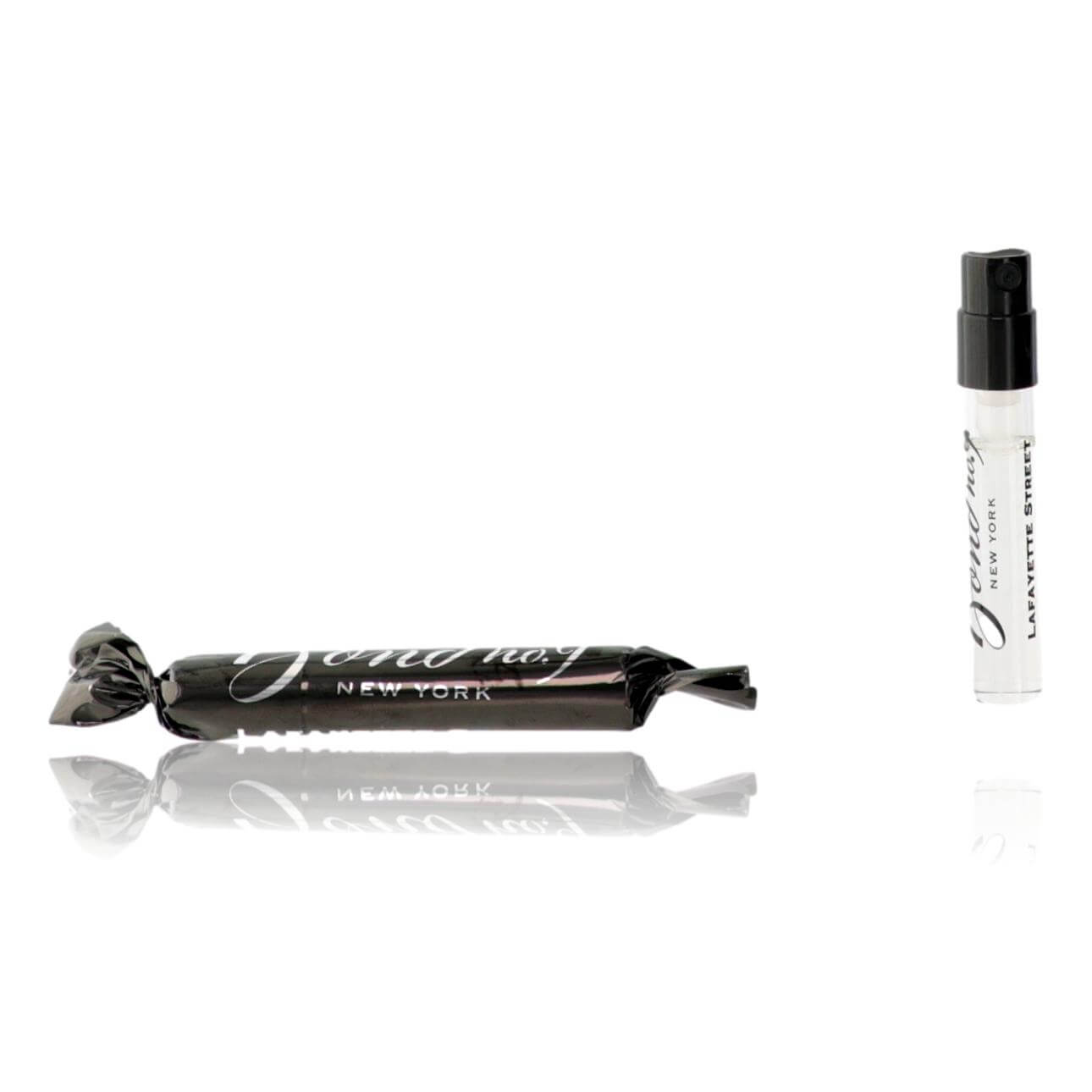 Bond No. 9 EDP spray vial with clear glass body and black cap, upright and box.