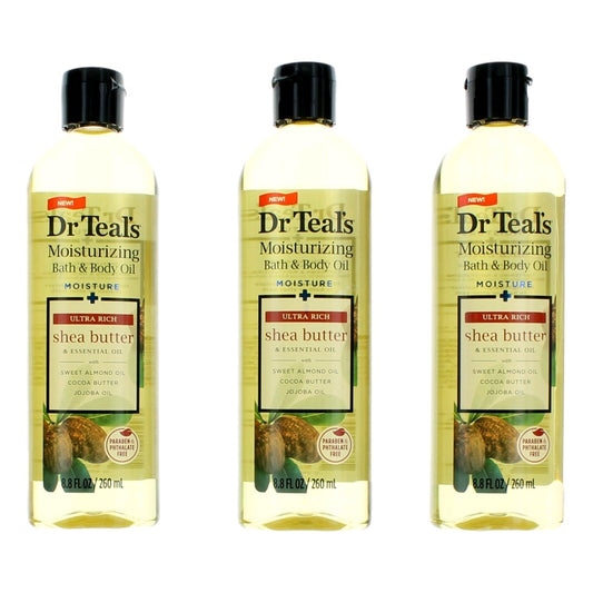 Bath and body oil trio bottles with black caps; shea butter and essential oil