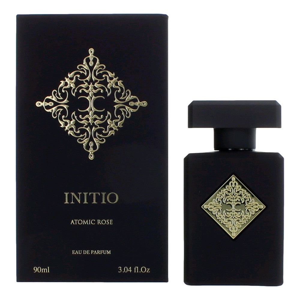 Atomic Rose by Initio eau de parfum bottle and box, black with ornate gold emblems