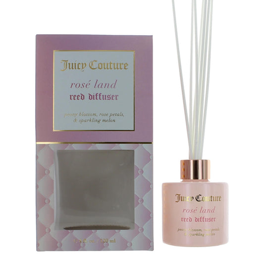 Rose Land reed diffuser in pink glass bottle with gold cap and white reeds