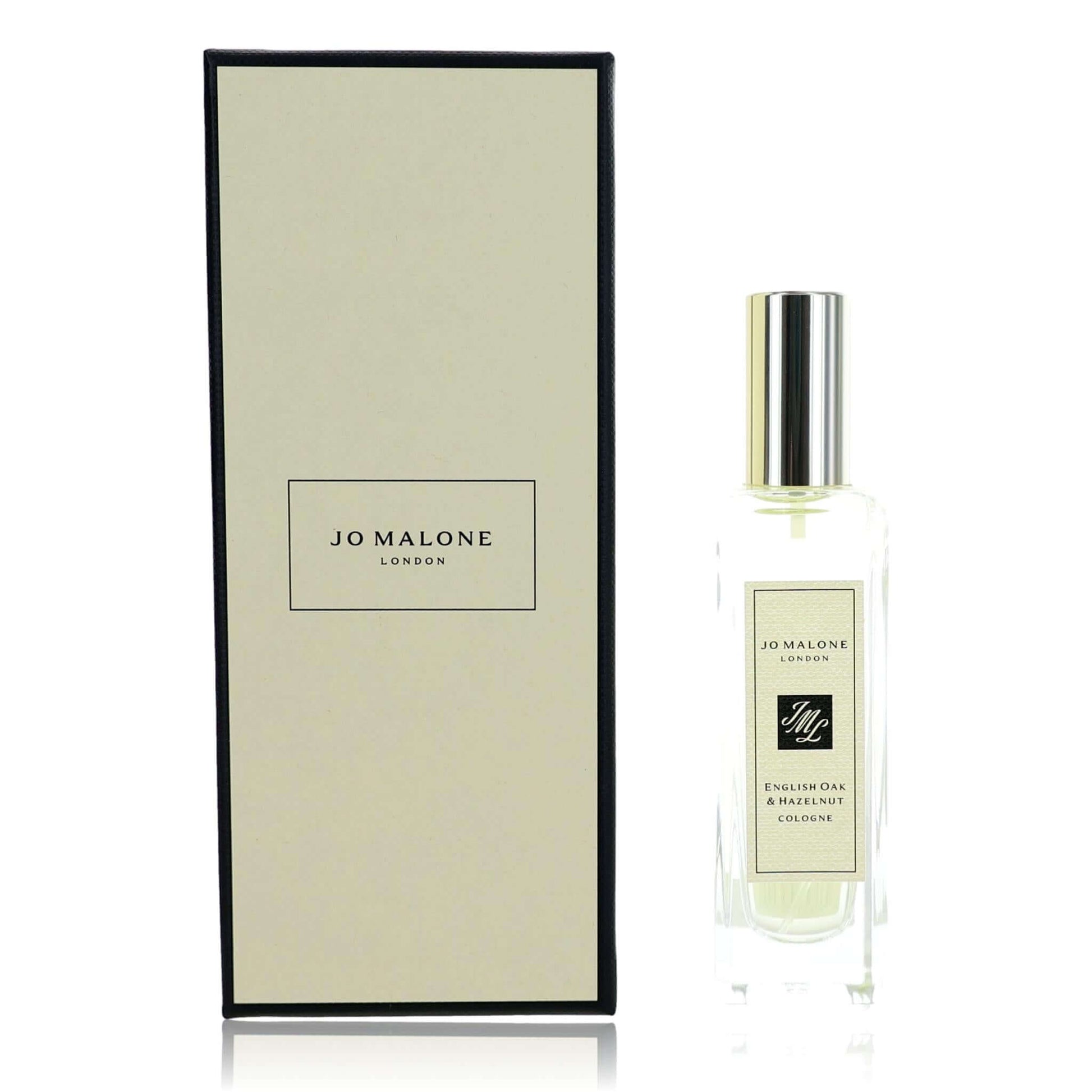 Clear cologne spray bottle with silver cap and rectangular gift box