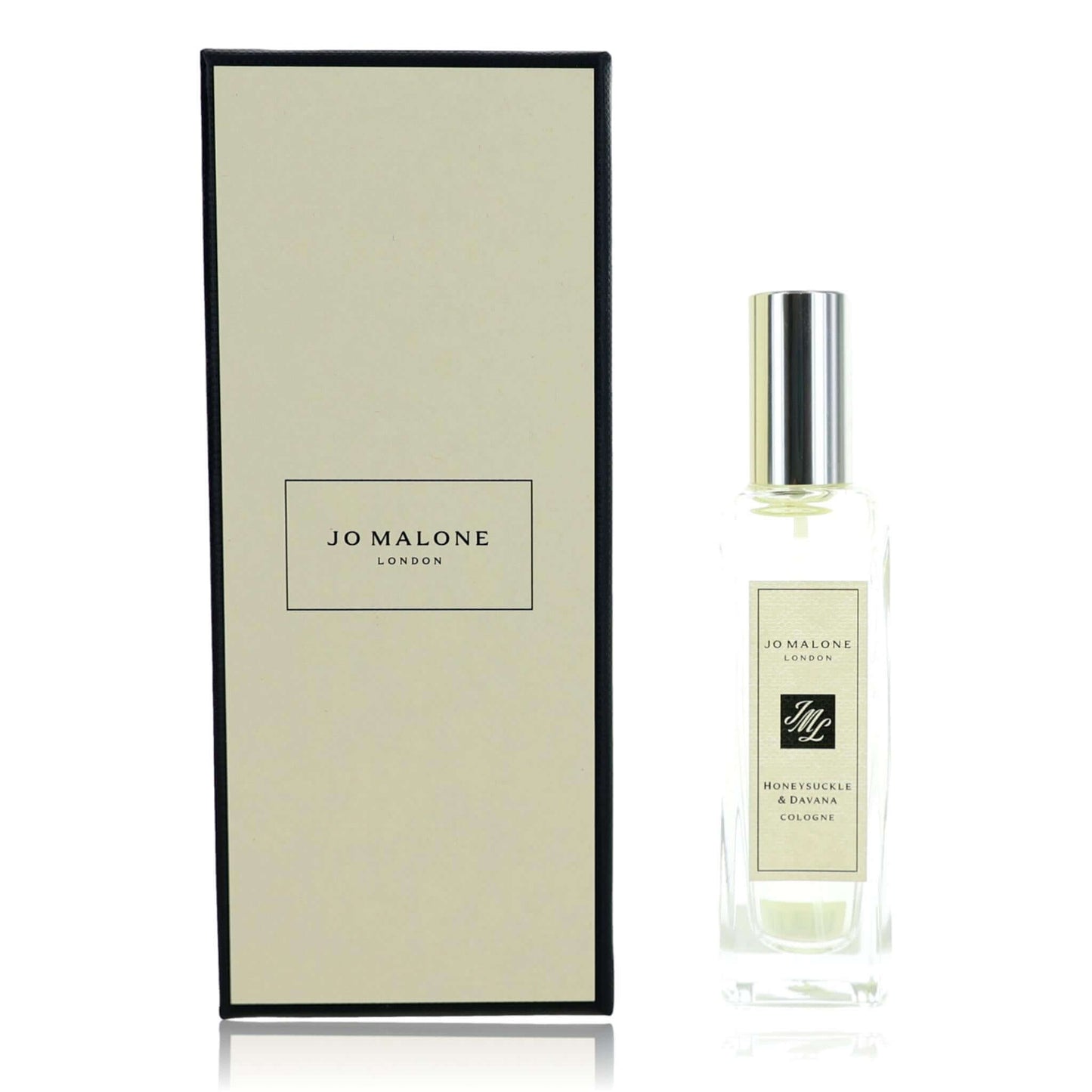 Cologne spray bottle with silver cap and box, clear glass body