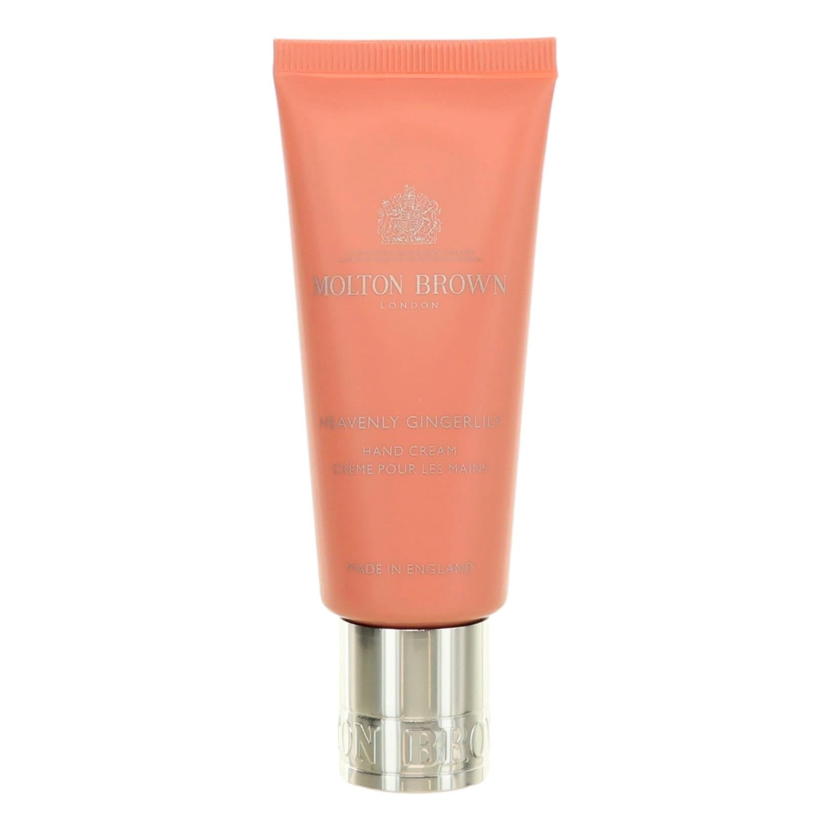 Molton Brown Heavenly Gingerlily hand cream tube, coral pink with silver cap