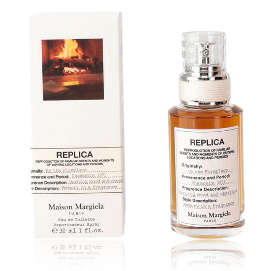 Replica By The Fireplace by Maison Margiela, 1oz EDT spray for Unisex in packaging with warm fireplace backdrop.