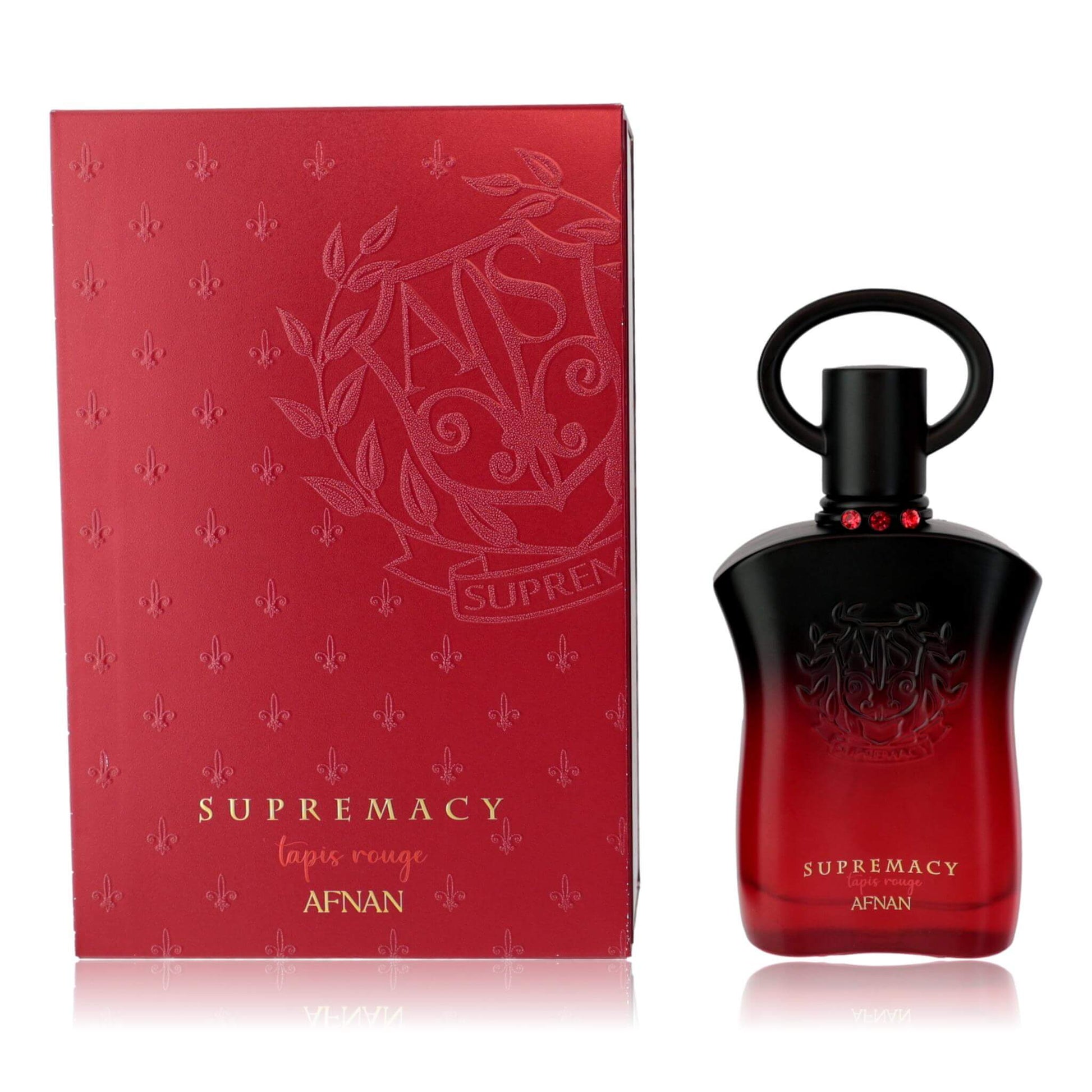 Perfume spray bottle with red glass, black cap, and matching red gift box