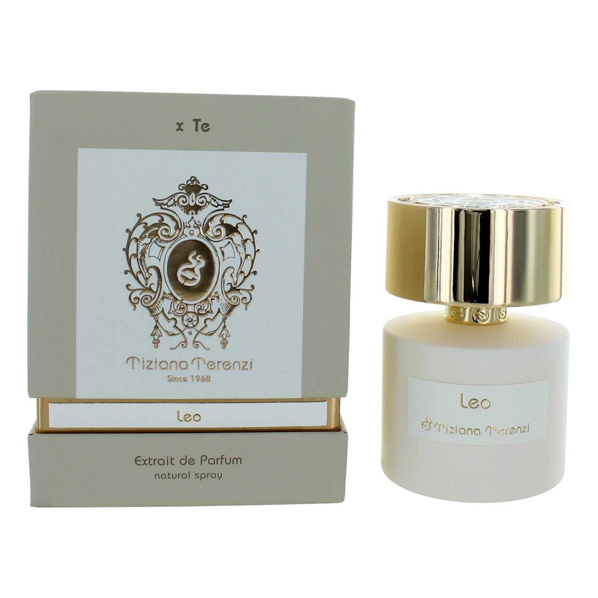 Unisex extrait de parfum spray bottle with gold cap, shown with matching box