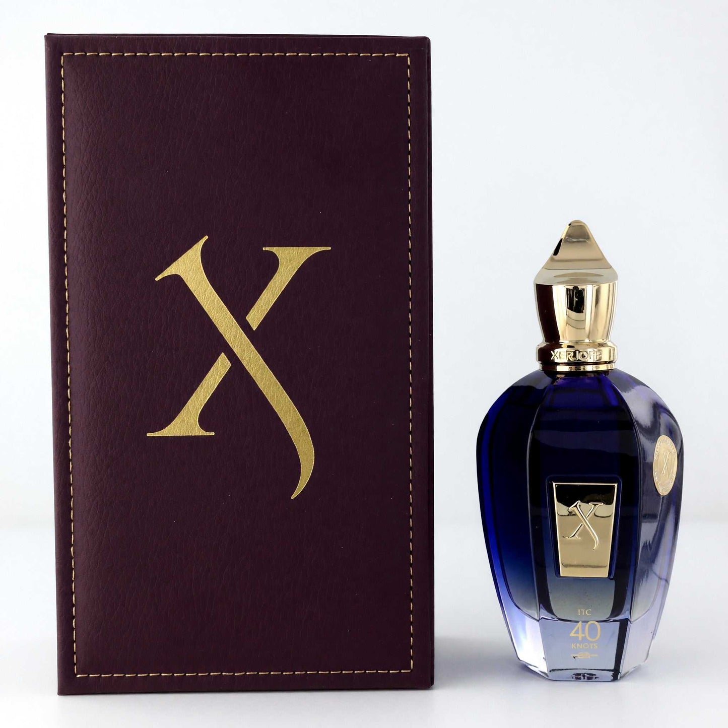 Xerjoff 40 Knots EDP spray: blue glass bottle with gold cap, in maroon box