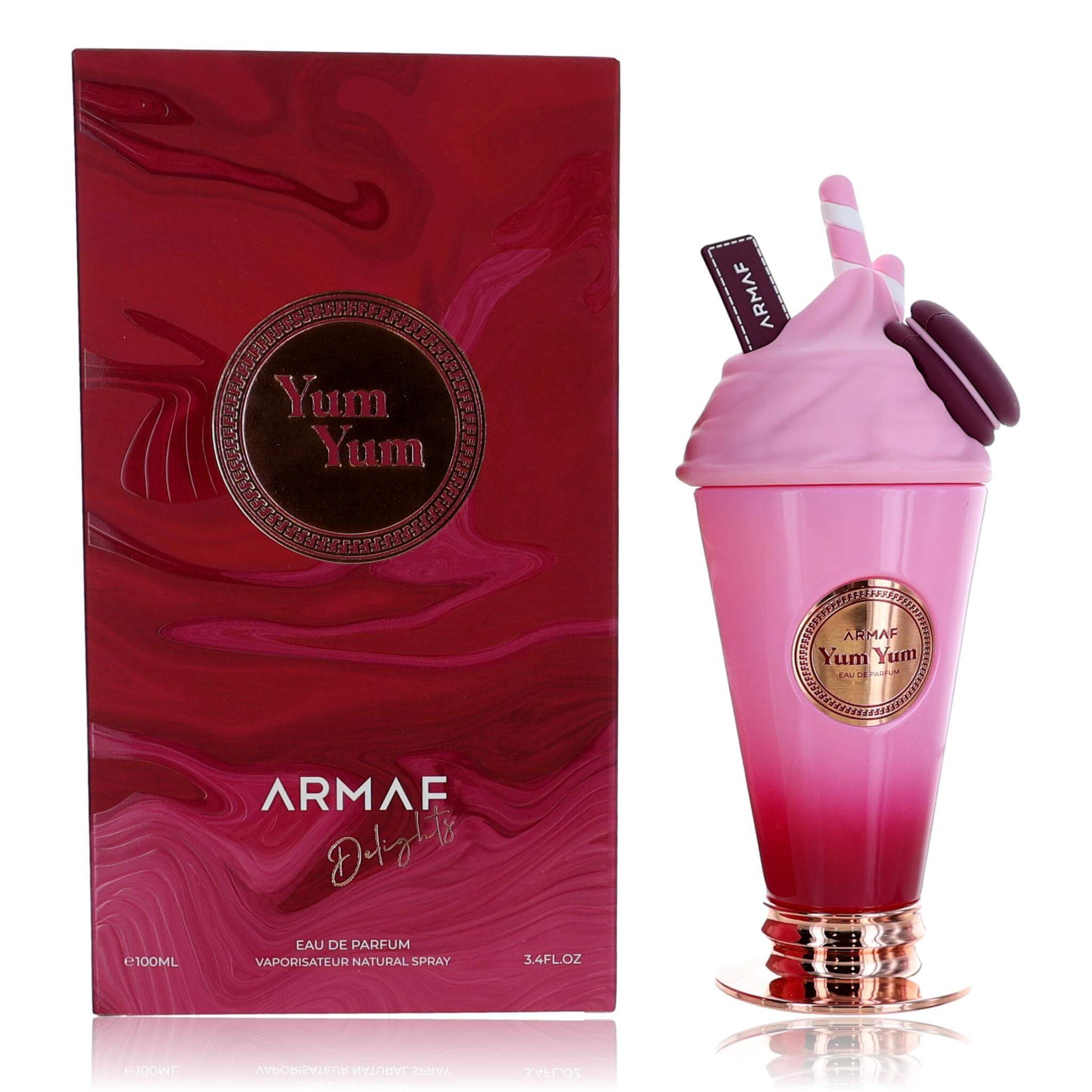 Womens EDP spray perfume with pink cup-shaped bottle and red Yum Yum box
