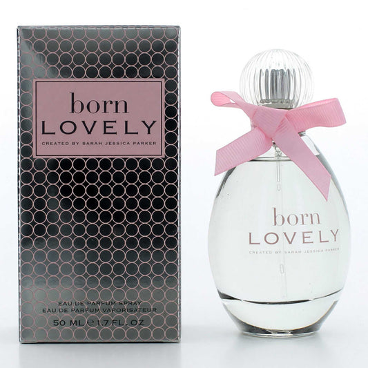 Women's eau de parfum spray bottle with pink ribbon bow, with matching box