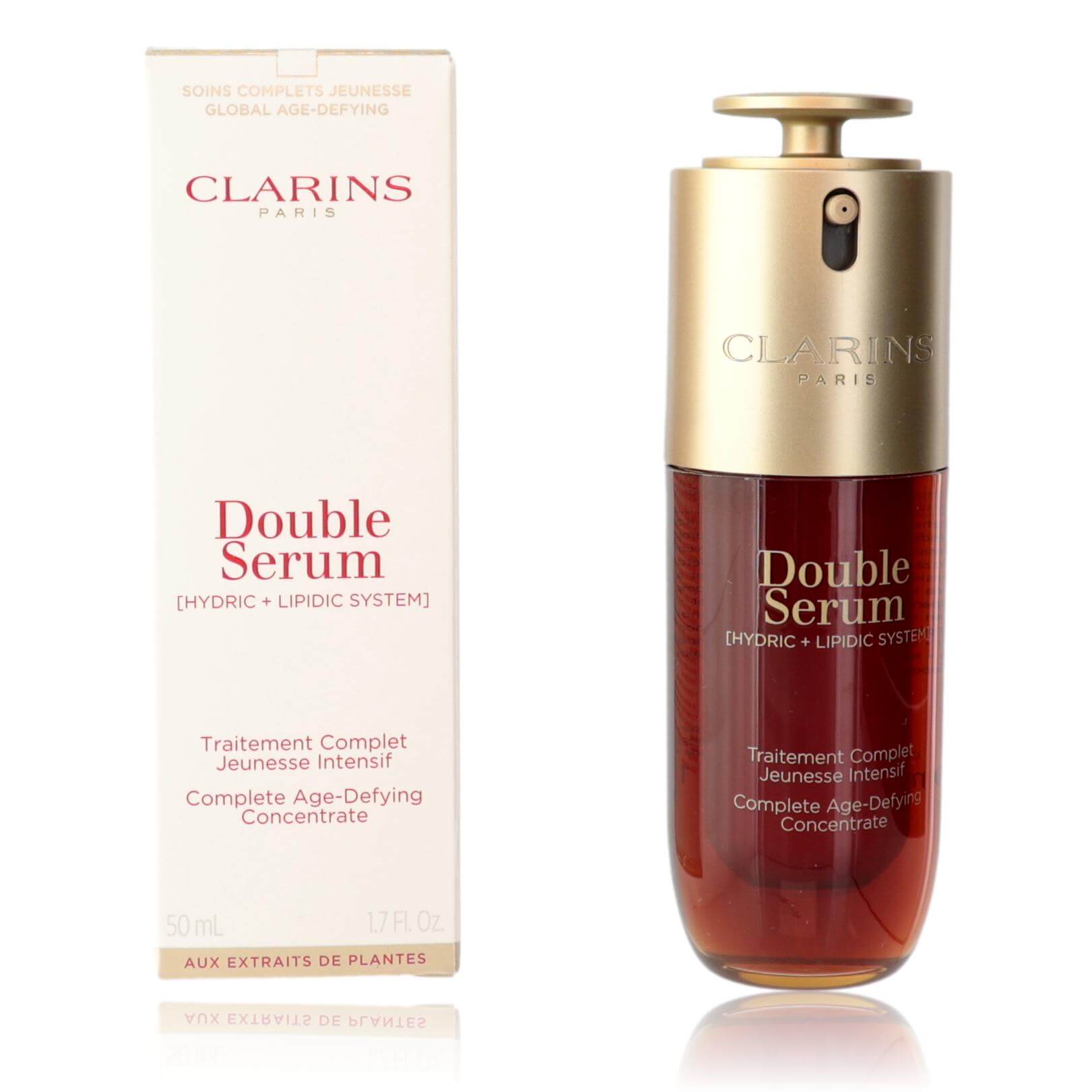Clarins double serum bottle with gold cap and red glass, plus white box