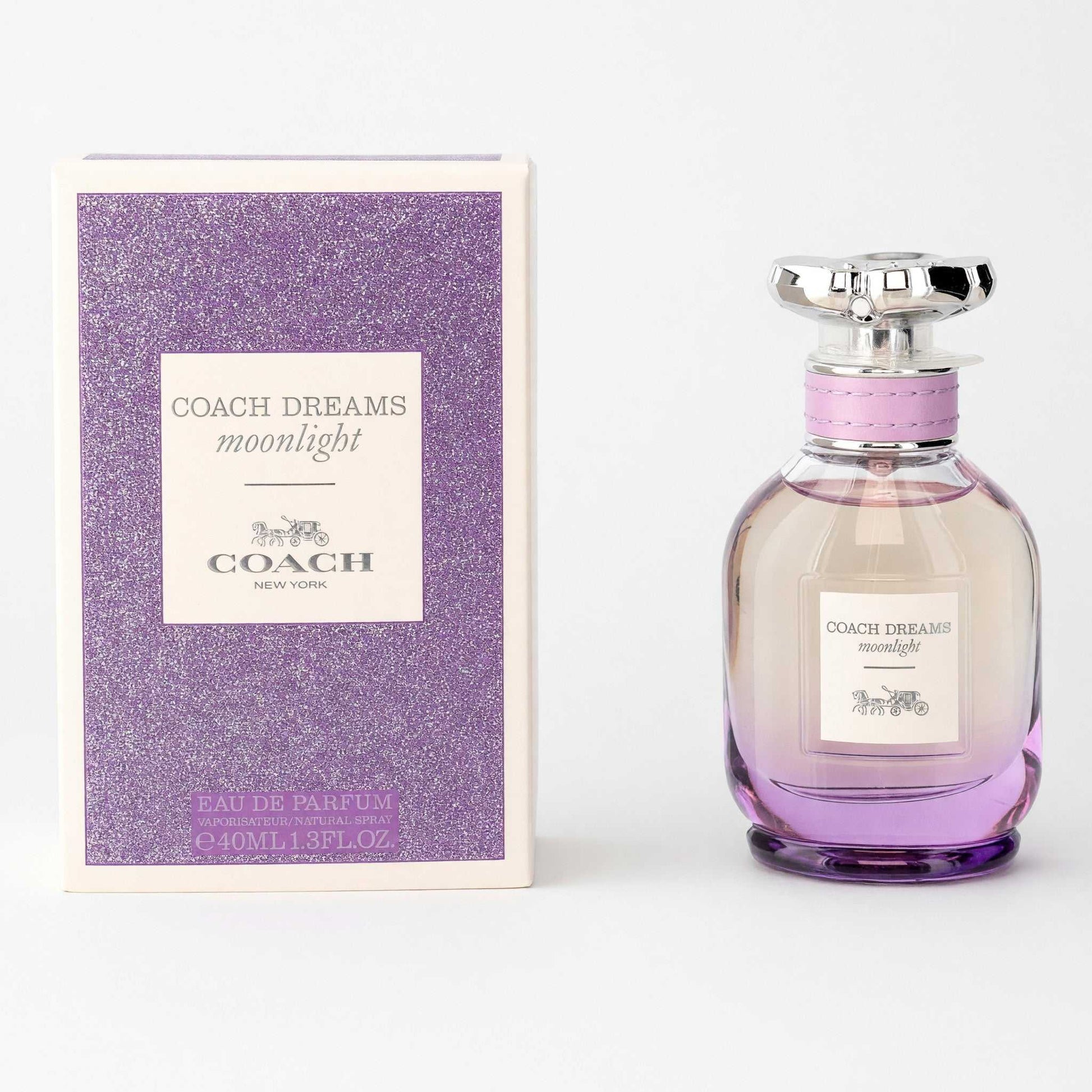 Women's eau de parfum spray with clear glass bottle, pink-purple liquid, and purple glitter box.