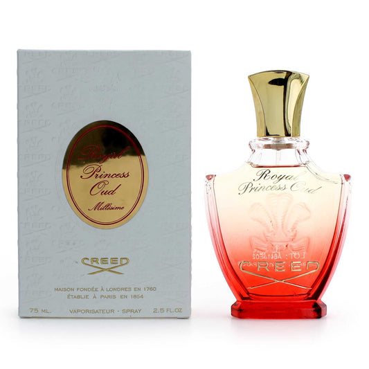 Women's oud perfume spray bottle with gold cap; pink glass, with logo box.