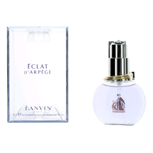 Women's eau de parfum spray bottle with light-blue glass and silver cap, with box