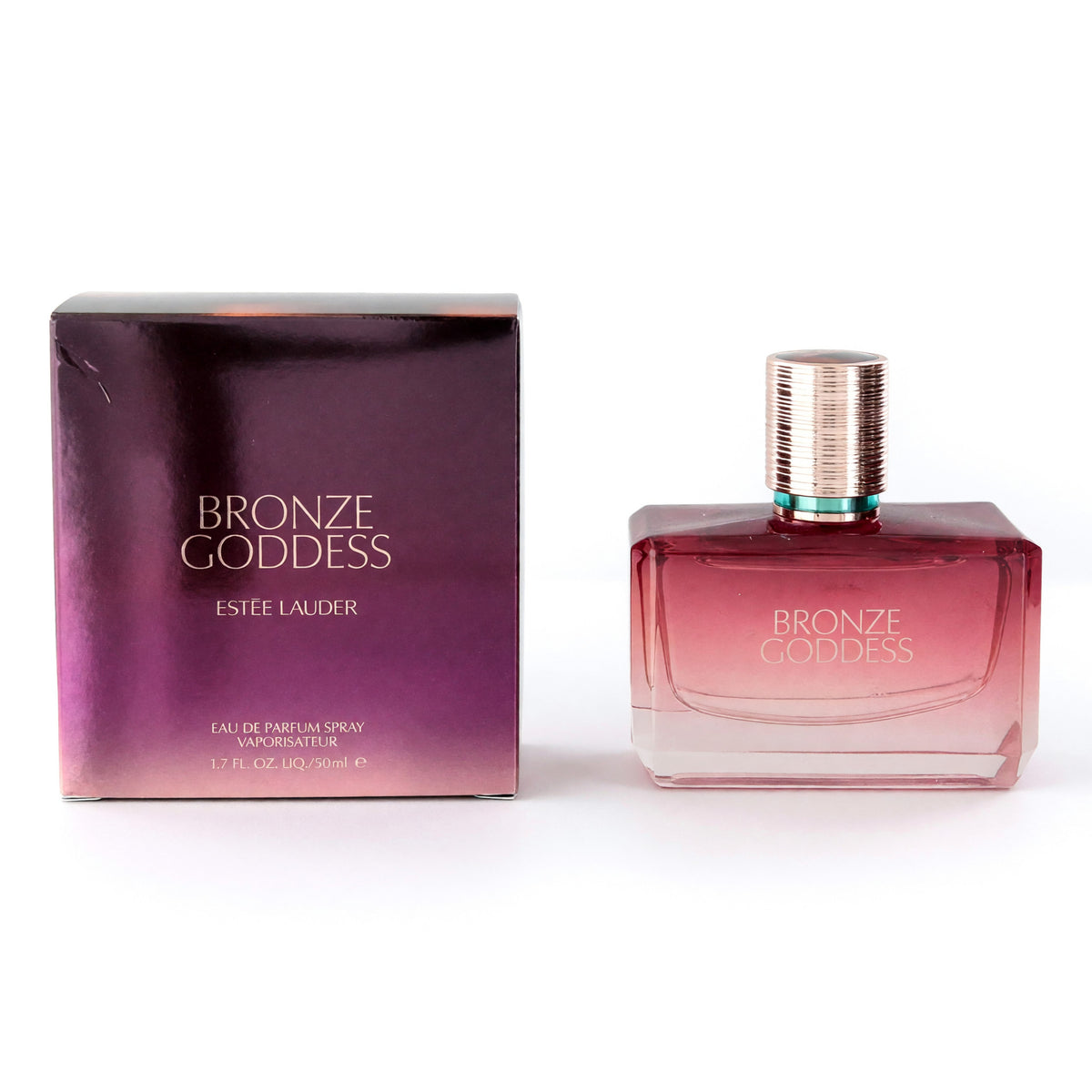 Bronze Goddess Eau de Parfum spray bottle with gold cap and boxed set