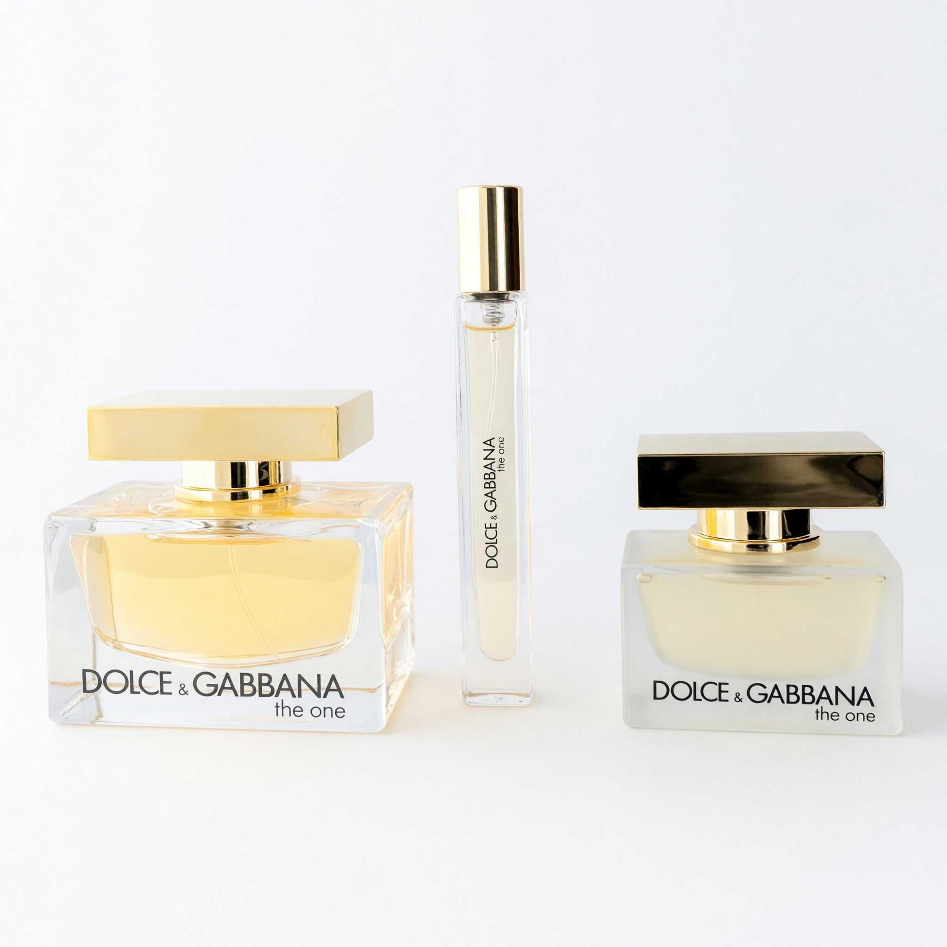 The One by Dolce & Gabbana 3-piece women’s perfume gift set, three bottles with gold caps