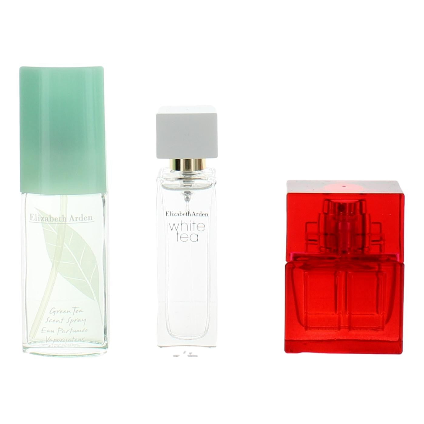 Three-piece fragrance gift set with three perfume bottles: mint green, clear, and red.
