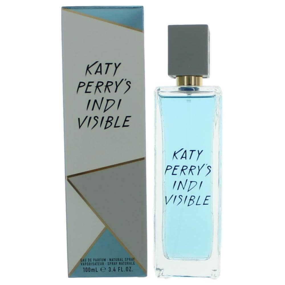 Eau de parfum spray bottle with light-blue liquid, gold cap, and matching box