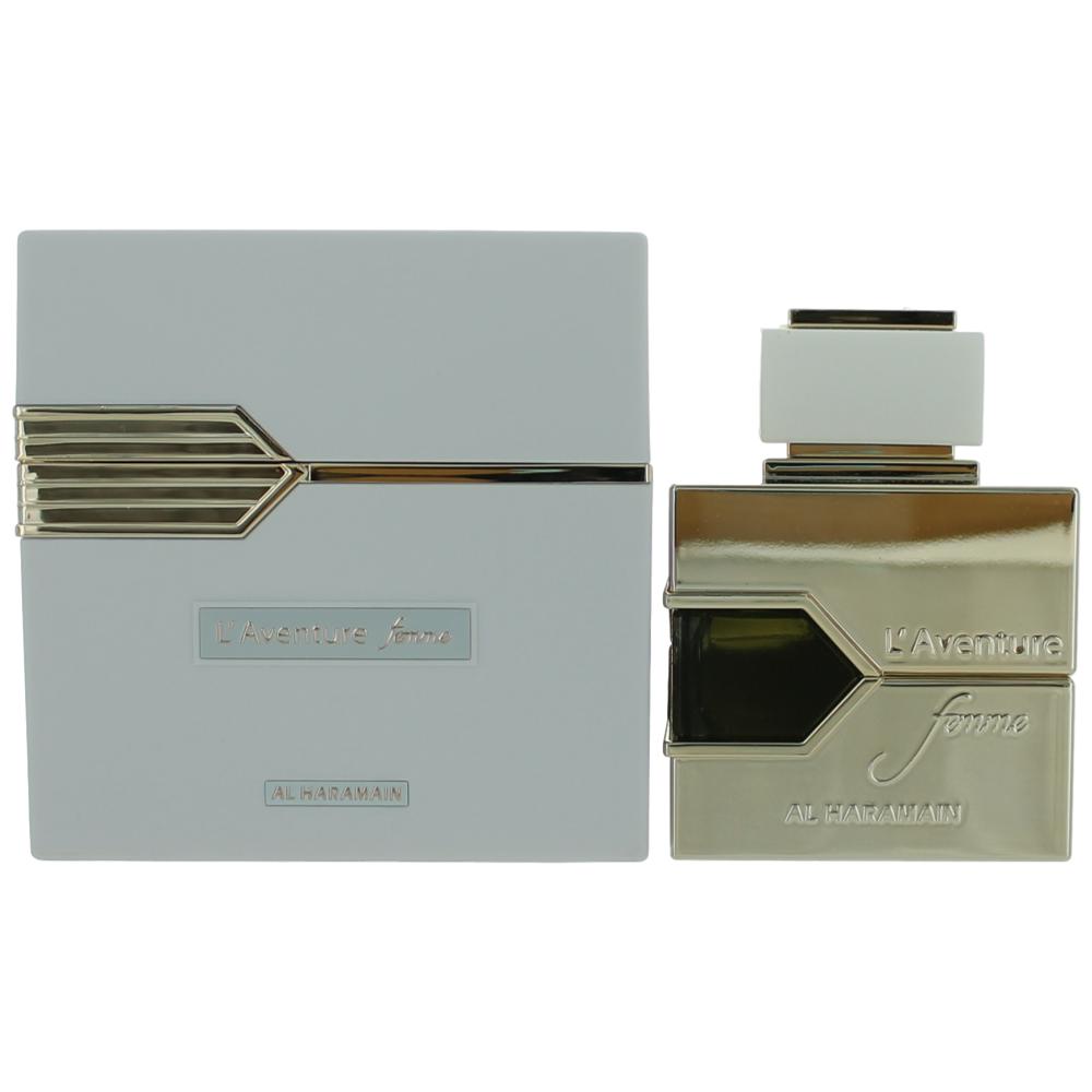 L'Aventure Femme women's EDP bottle and box, light green glass, gold accents